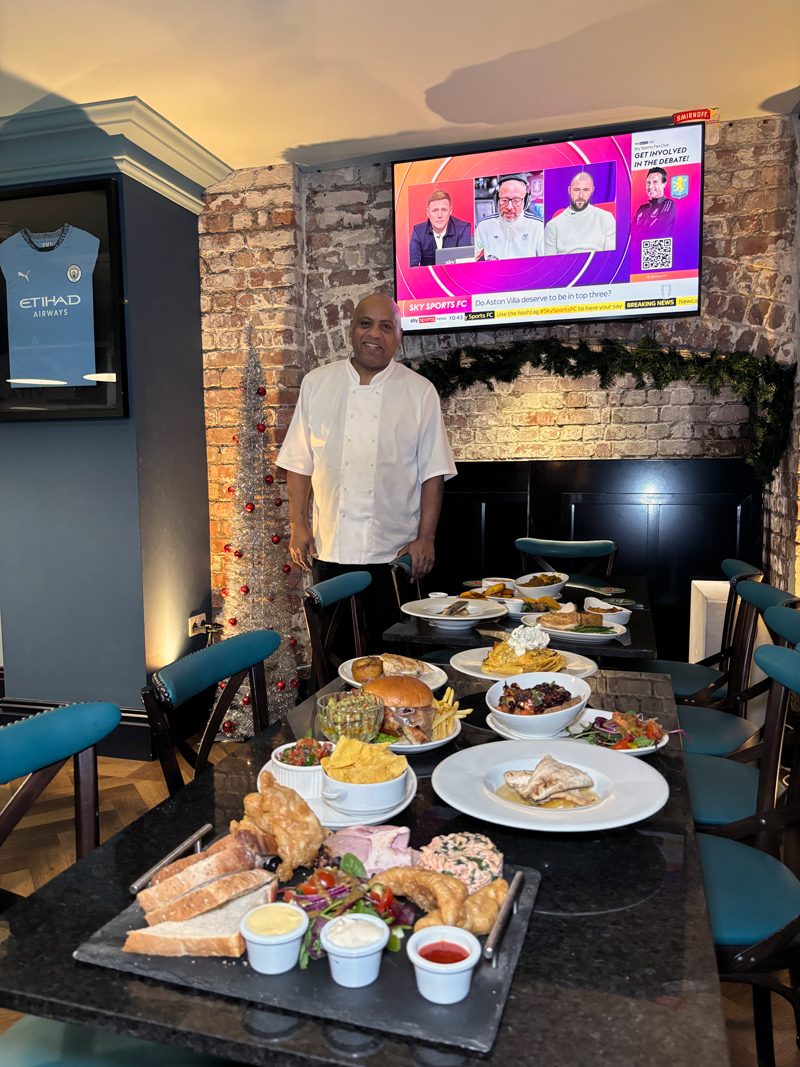 The chef with a catering spread laid on for a private event at The White Lion